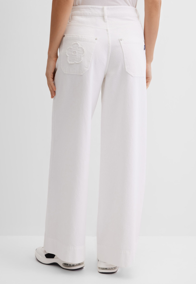 Джинсы широкие