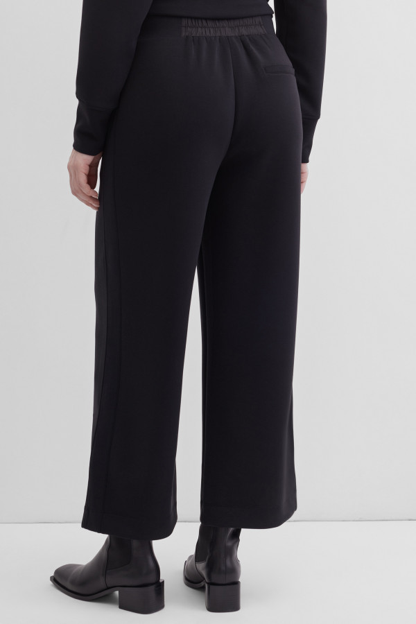 Брюки-клеш от колена