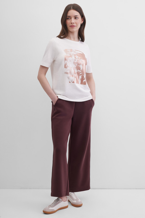 Брюки-клеш от колена