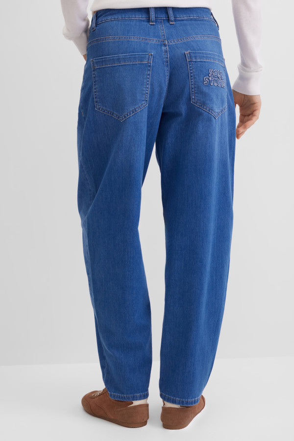 Джинсы бананы