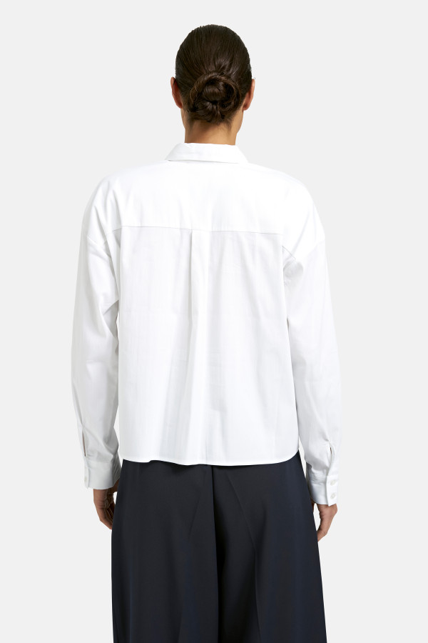 Блузка с накладными карманами